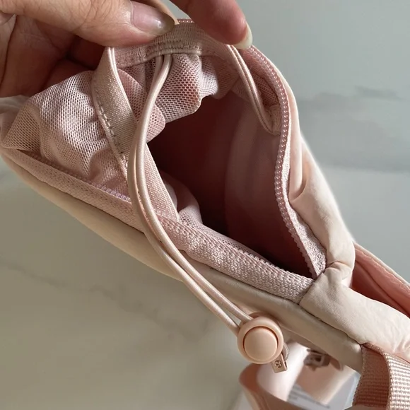 Lululemon Light Pink Curved Crossbody Bag